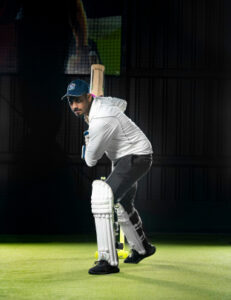 A batsman plays box cricket in Chennai.