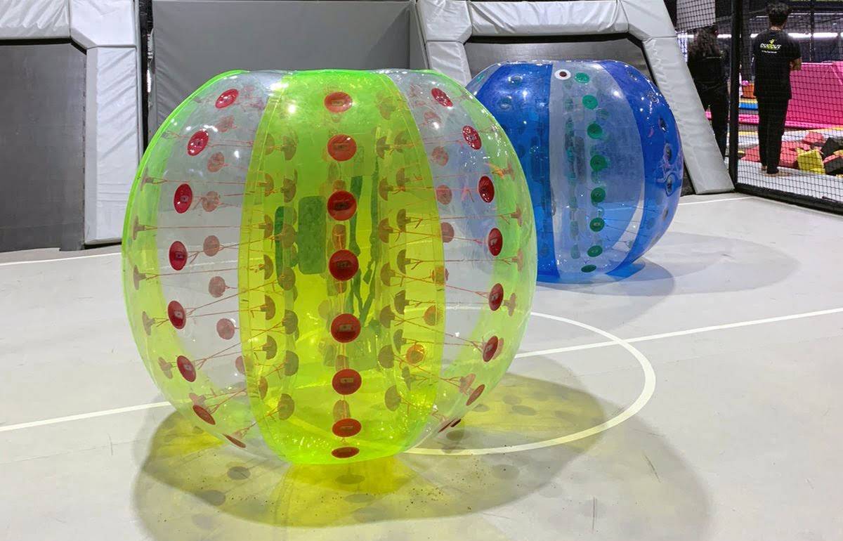 Image of green and blue Zorbing balls in Dugout in Chennai.